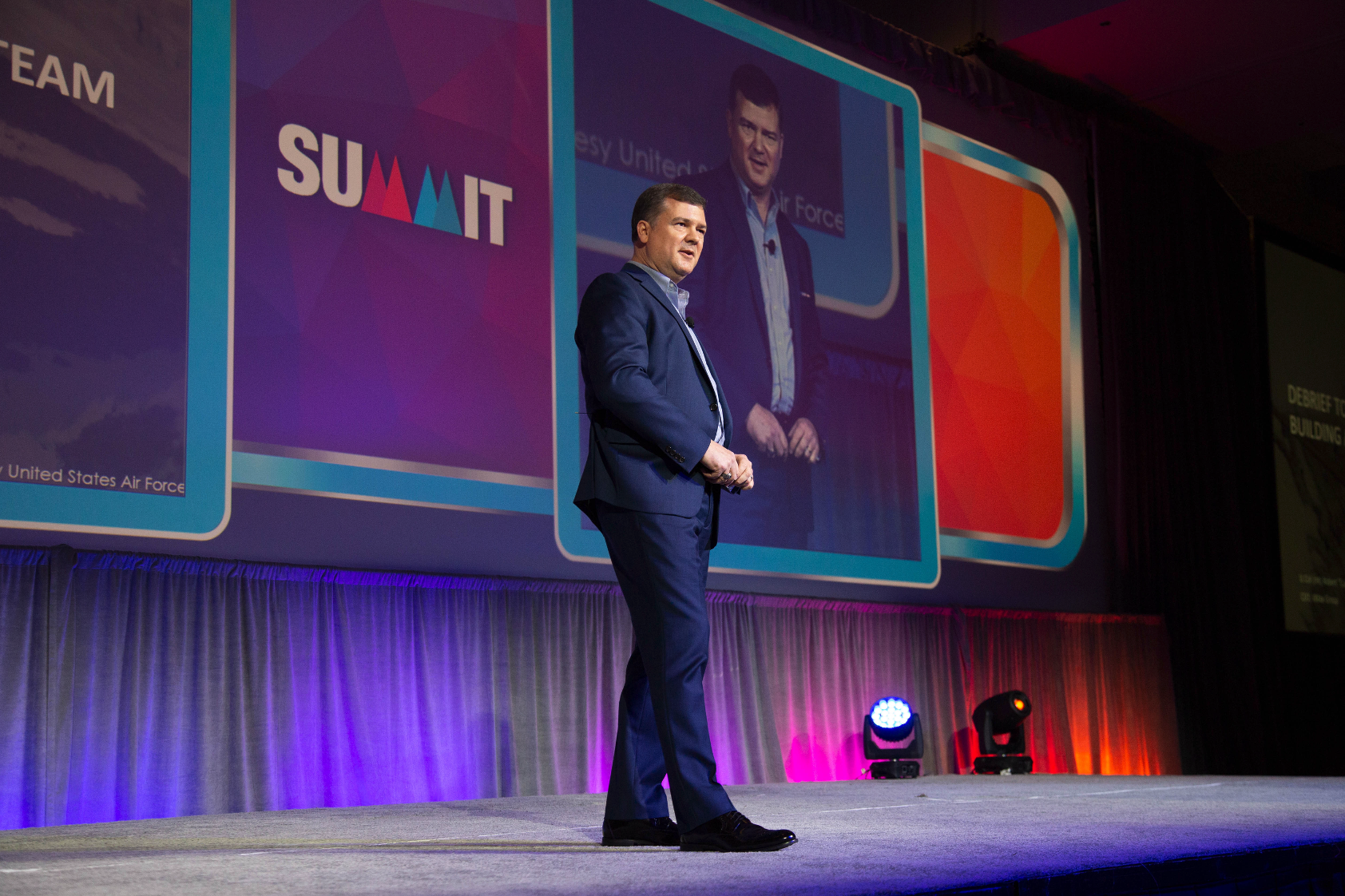Robert Cujo Teschner delivering a keynote on stage